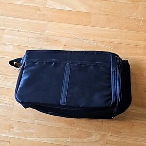 A black women's expandable handbag